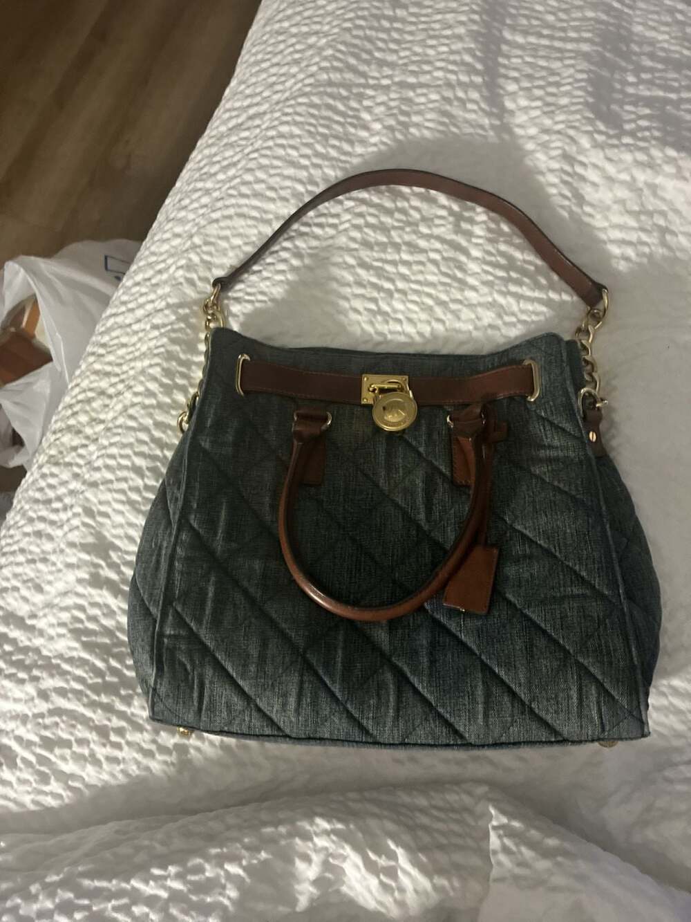 Authentic Michael Kors Denim and leather tote...